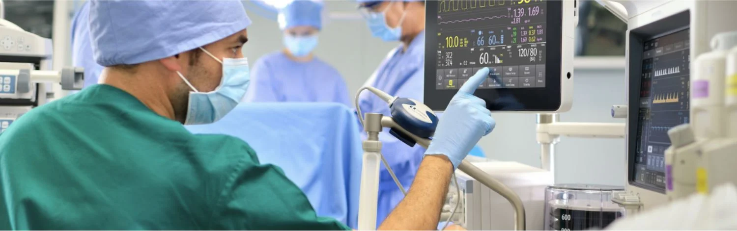 a close-up of a person operating a medical device