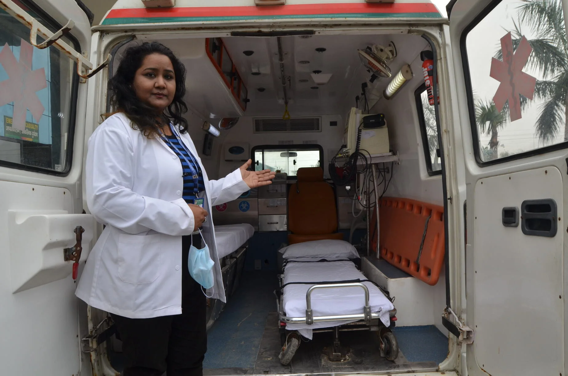 One Female and Backside of Ambulance